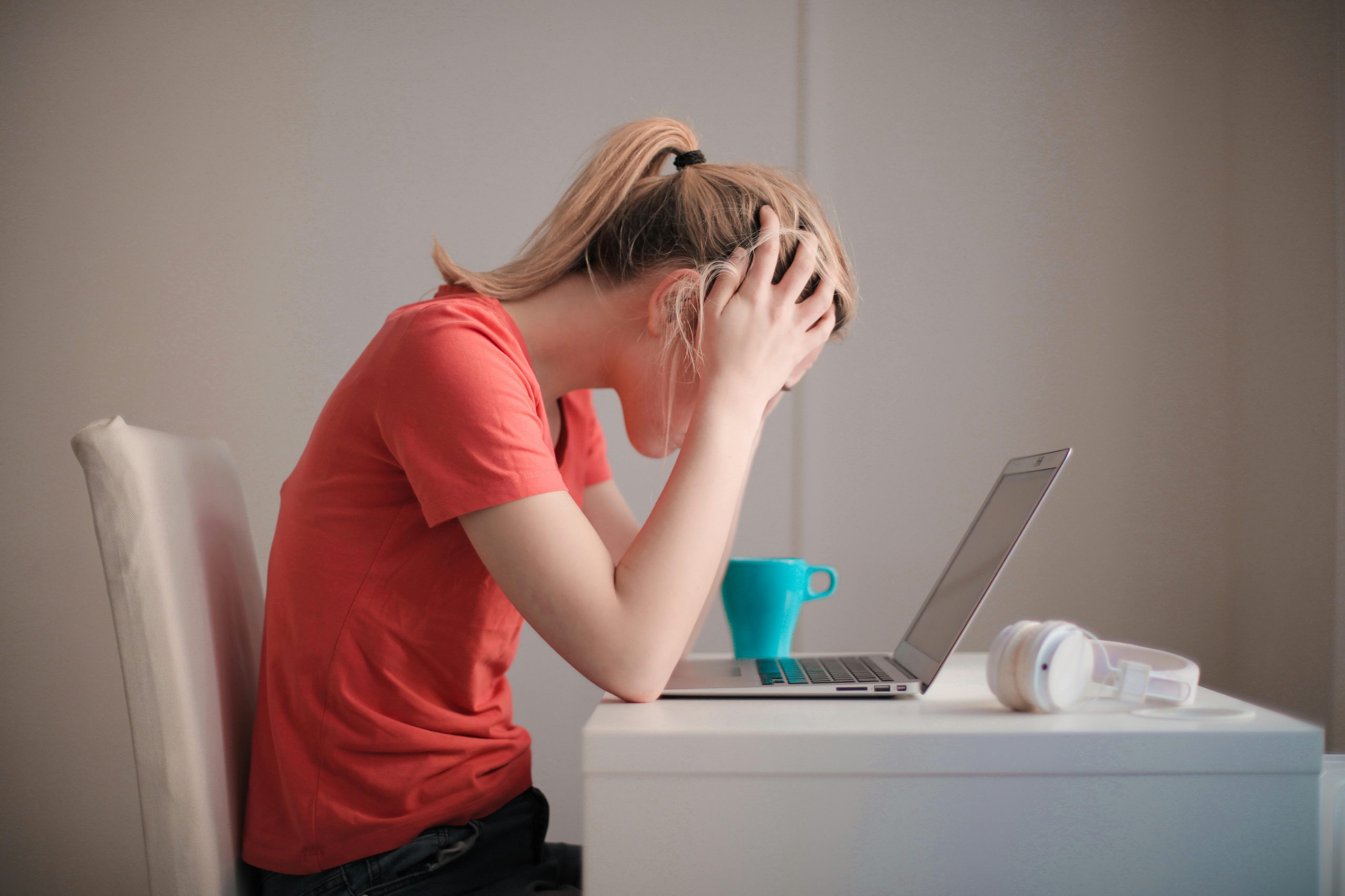 Stressed Student on Laptop